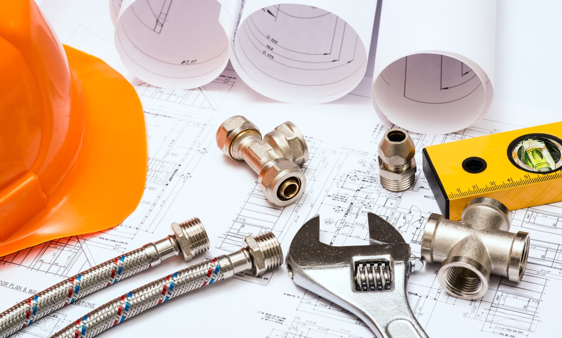 House construction plans Standard construction safety equipment on architectural drawing of house, building or home project.